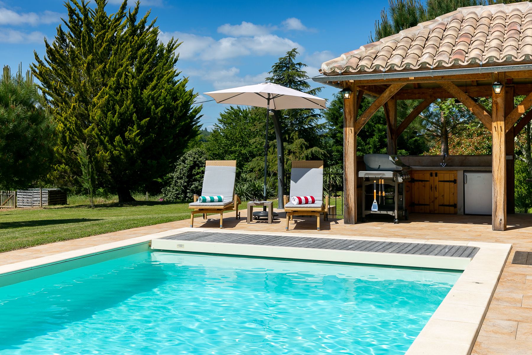 The pool and the summer kitchen
