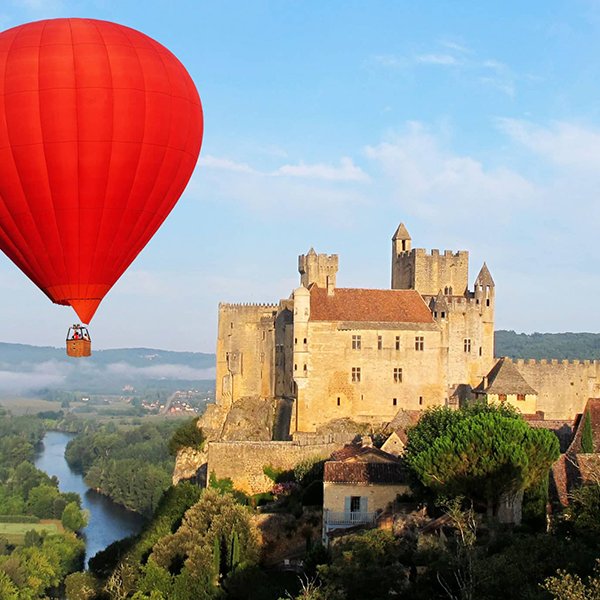 A hot air balloon over the Dordogne near Beynac